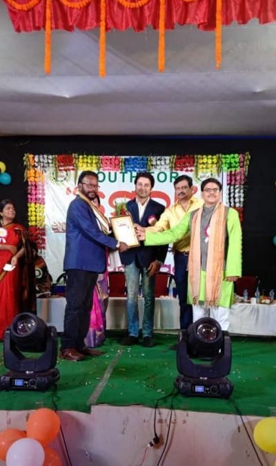 Chabila being awarded as best social worker in the region